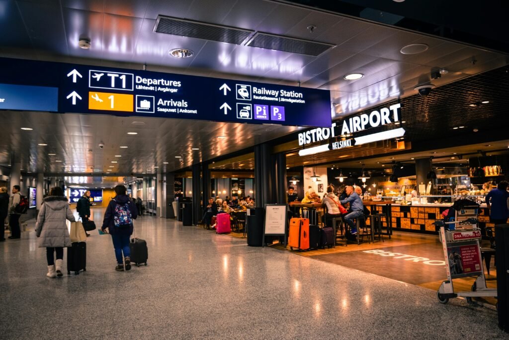 pexels-photo-804463-804463 Travelers at Helsinki Airport dining and shopping near departures and arrivals.
